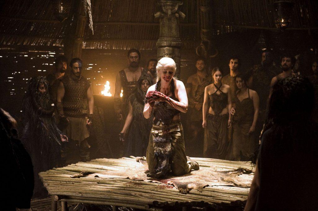 Daenerys Targaryen eating a horse's heart in the Temple of Dosh Khaleen