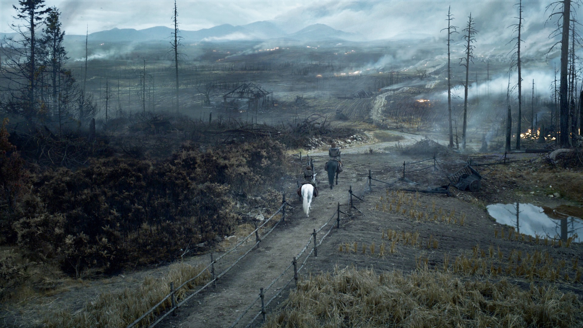 Arya and Sandor ride through the war-torn countryside in Season 4, Episode 1
